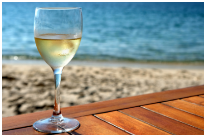 A glass of Riesling by the Beach